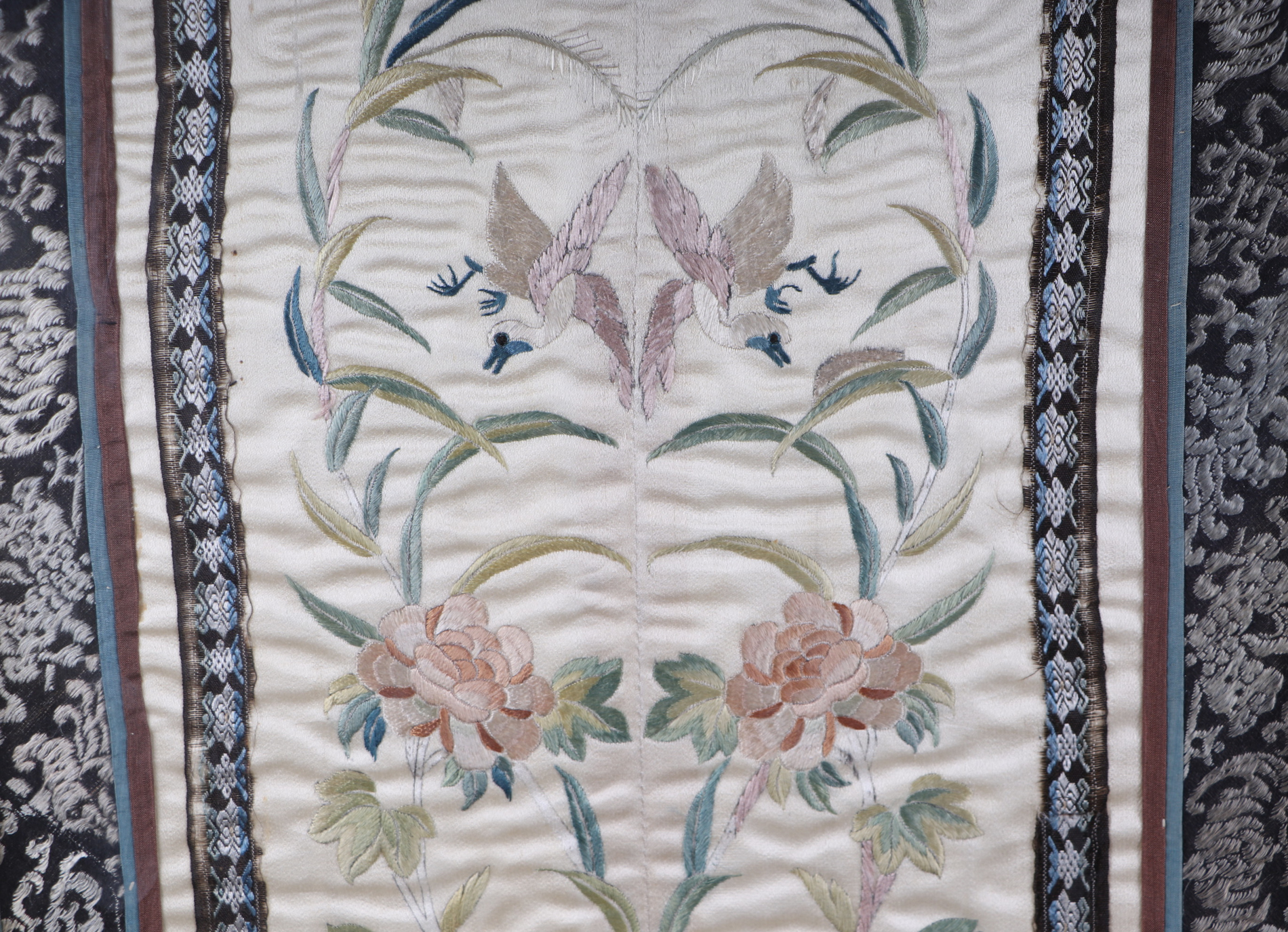 A Chinese silk embroidered sleeve panels decorated with birds amongst foliage, framed & glazed, 32 - Image 2 of 4