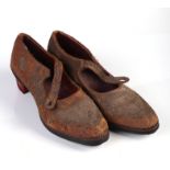 A pair of 19th century Ottoman Turkish brocade and leather shoes. Condition Report Both shoes are