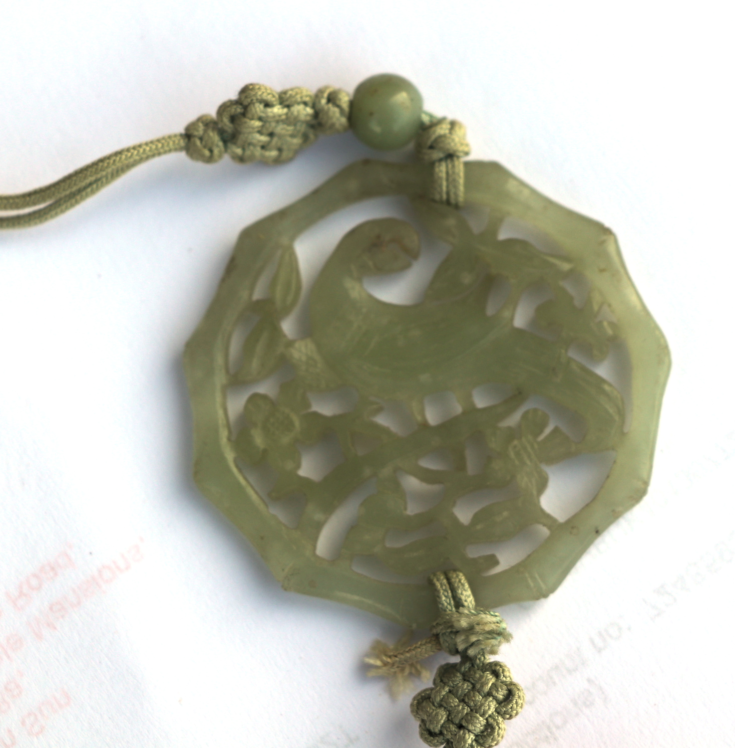 A Chinese pierced jade pendant decorated with a parrot amongst foliage; together with a boxed set of - Image 2 of 4