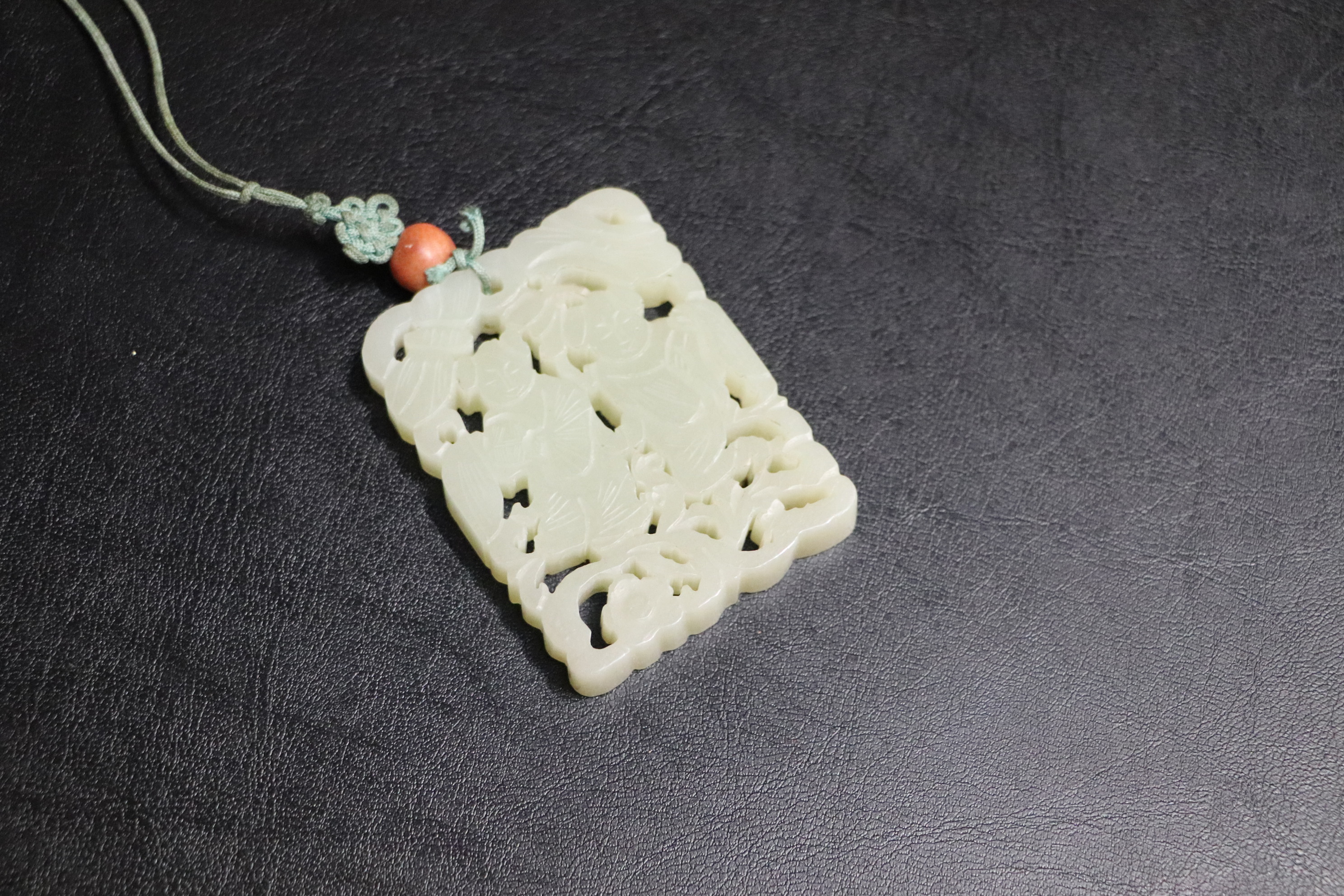 A Chinese pierced jade pendant, 5 by 6.5cms. Condition Report Good overall condition with no visible - Image 4 of 13