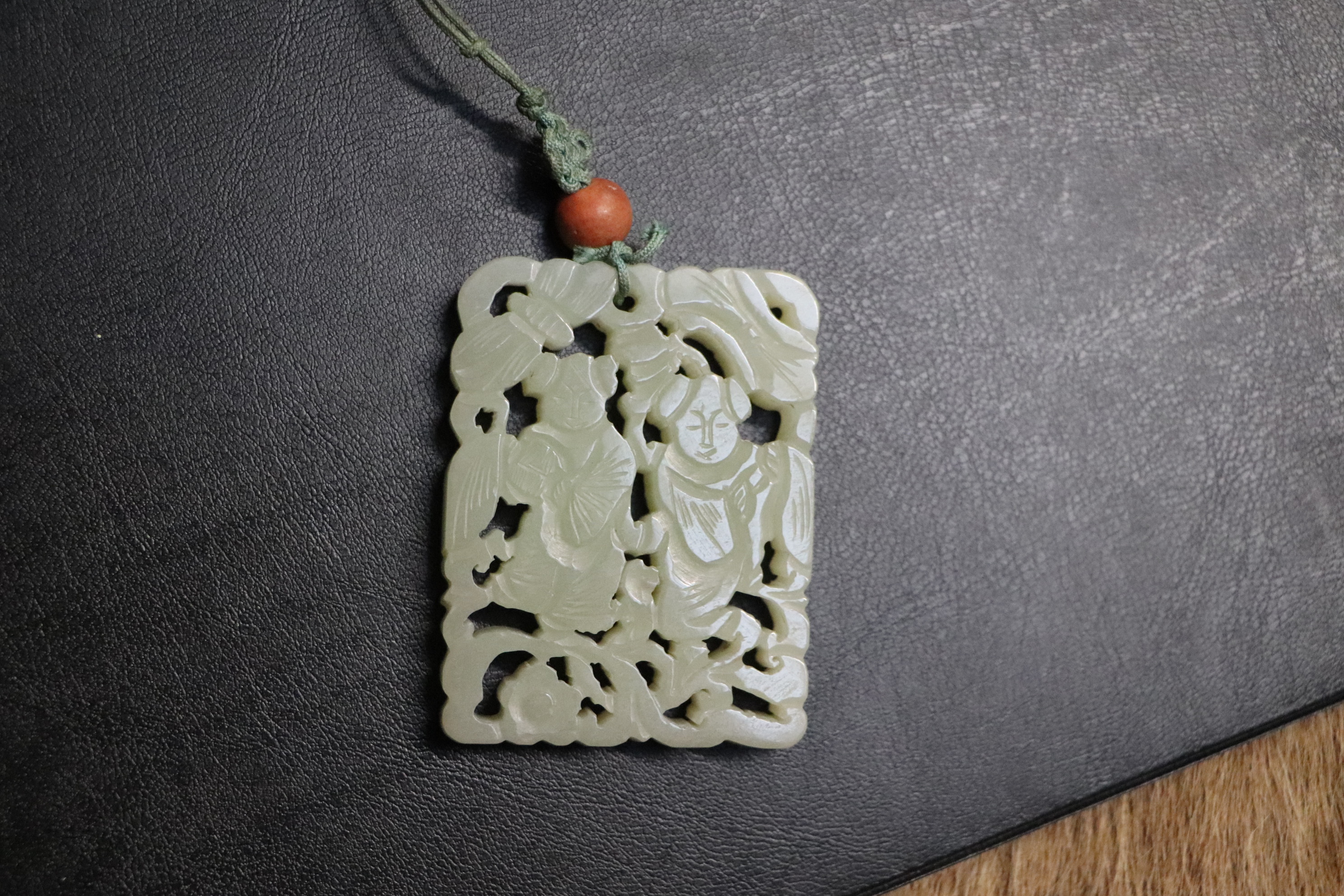 A Chinese pierced jade pendant, 5 by 6.5cms. Condition Report Good overall condition with no visible - Image 5 of 13