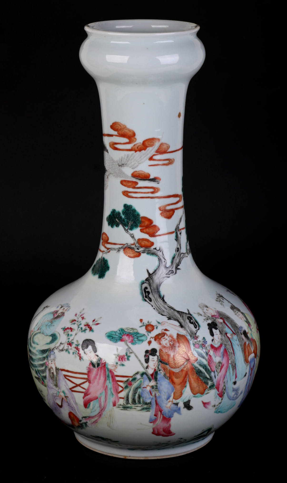 A large Chinese famille rose bottle vase decorated with figures on a terrace, 43cms high.