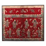 A large Chinese silk embroidered panel decorated with figures in a landscape with bats and