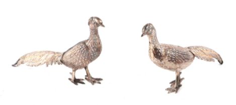 A pair of Spanish silver models of pheasants, largest 16cm long, 68g.