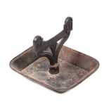 A Victorian cast iron boot scraper.