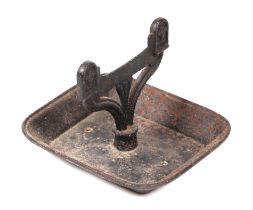 A Victorian cast iron boot scraper.