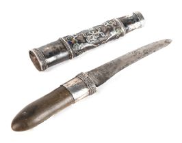 A 19th century Burmese Dha dagger with white metal mounted horn handle and white metal and enamel