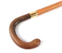 A Malacca walking stick with horn handle and 18ct gold collar, 87cms long. Condition Report The