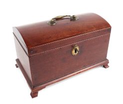 A 19th century mahogany dome topped tea caddy on bracket feet, 24cms wide.