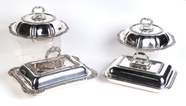 A pair of Victorian style shaped circular entree dishes and covers with gadrooned rims, each 26cms