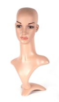 A shop display mannequin head and shoulders, 52cms high.(a/f)