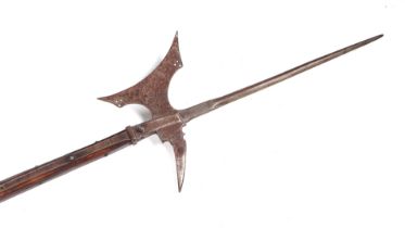 A 16th century style continental Halberd on a chamfered oak shaft, 206cms high. Condition Report