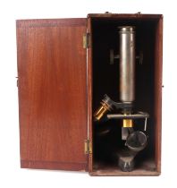A Beck of London monocular microscope fitted in a mahogany case (a/f).