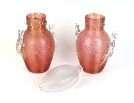 An unusual pair of late Victorian threaded gold over cranberry glass vases, probably by Stevens &