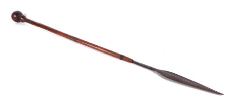 A South African Assegai / Zulu spear with broad leaf shaped stabbing blade, hardwood shaft with