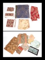 A quantity of textile remnants to include vintage curtains and upholstery fabric.