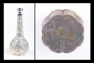 A Chinese silver coloured metal scent bottle marked 'Shanghai Woshing', 10cms high; together with
