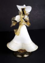 An Italian Murano Art glass figure depicting a woman in a long flowing dress, 37cms high.