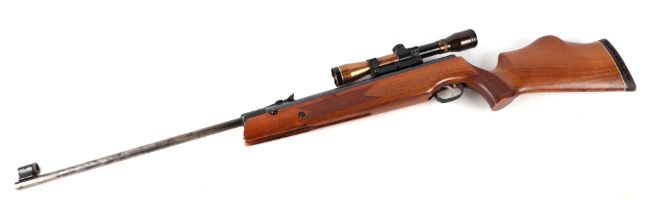 A Weihrauch HW80 .22 air rifle with telescopic sights. Condition Report Single barrel