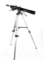 A Celestron Firstscope 80EQ F-900mm F/11 model 21086 telescope on tripod.