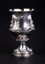 A Victorian silver goblet or chalice decorated flowers, with presentation inscription, London