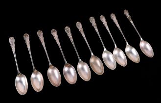 A set of eleven George VI silver teaspoons, Birmingham 1936, 150g; together with other silver