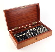 An early 20th century Stanley of London mahogany case drawing set to include compasses and dividers.