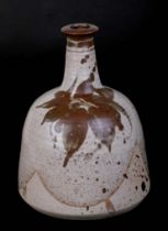 A Studio Pottery mallet form vase with slipware glaze decoration, impress mark to side of base,