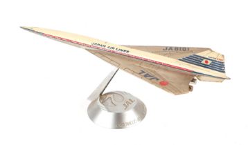 A 1960's cast model of a Japan Airlines 2707, 31cms long. Condition Report Some of the paint is