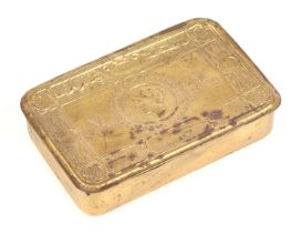 A WWI 1914 Princess Mary Christmas tin containing Christmas card, two lighters and a razor.