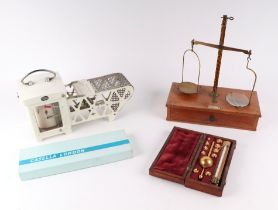 A Casella of London Thermohygrograph, a mahogany cased Sikes Hydrometer; together with a William