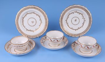 A Royal Crown Derby trio comprising tea bowl, saucer and sandwich plate with gilt decoration;