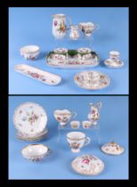 A quantity of Dresden porcelain to include a desk stand, cream jug, plates and other items.