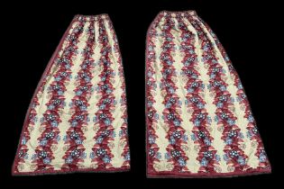 A pair of lined curtains with floral decoration, 235cms drop and width 110cms (2).