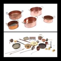 A set of three oval graduated copper cooking pans, the largest 31cm wide (excluding handles), to