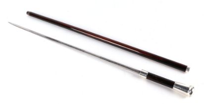 A silver topped and mounted hardwood swordstick (possibly coromandel), the tapering blade marked '