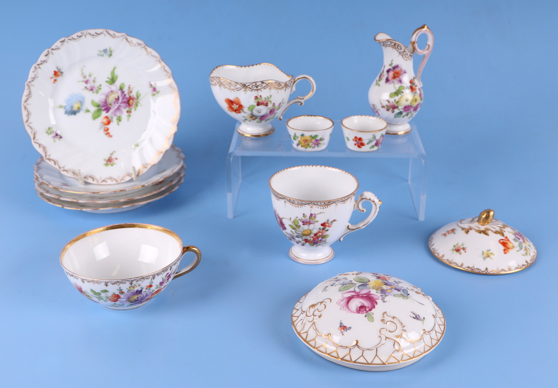 A quantity of Dresden porcelain to include a desk stand, cream jug, plates and other items. - Image 3 of 3