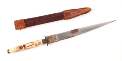 An Art Nouveau steel bladed dagger in leather scabbard, overall 28cms, blade length 18cms.