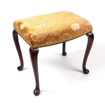 A Georgian style mahogany stool on cabriole legs with upholstered seat, 52cms wide.
