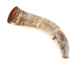 A cow horn powder flask with scrimshaw decoration (a/f), approx 13cms long. Condition Report The