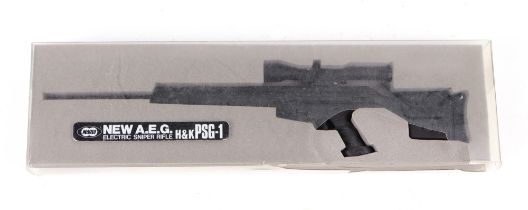A metal model of a Marui New A.E.G. Electric Sniper Rifle H&K PSG-1 with stand. Length 20cms (7.