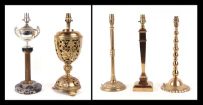 A group of brass table lamps, largest 42cm high (5).