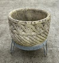 A well weathered stoneware garden planter, on a galvanised stand, 36cm diameter.