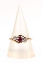 A 9ct gold three stone ruby and diamond ring, approx UK size O, 2.1g