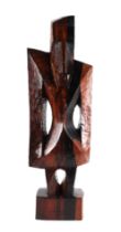 Ben Osawe (Nigerian 1931-2007) A carved hard wood totem figure, signed and dated 1970, 82cm high.