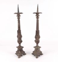 A pair of gothic revival silver plated pricket candle sticks, 56cm high (2).