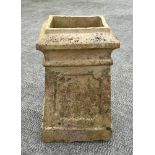 A Victorian chimney pot, of square form, 58cm high.