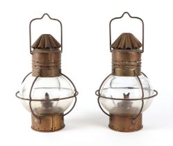 A pair of Arts and Crafts style paraffin lanterns,. each approx 26cm high. (2)