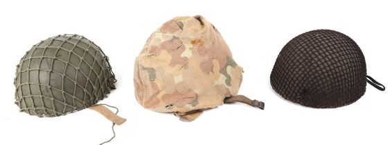 A group of three military helmets. Condition Report All have straps