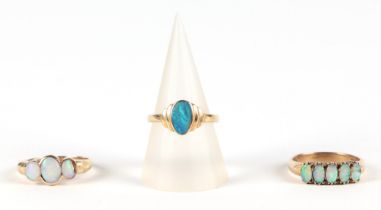 A 14ct gold opal dress ring, approx UK size M, 1.8g, a 9ct five stone opal ring, approx UK size P,